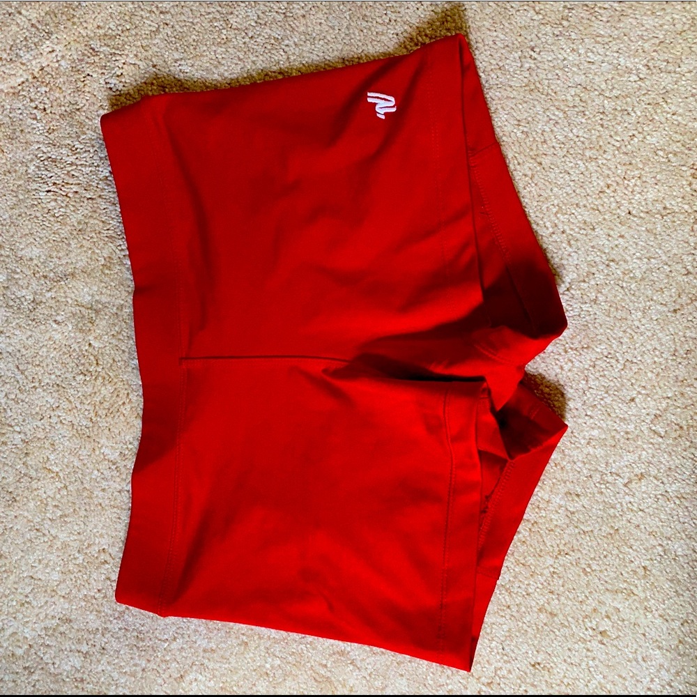 Red varsity spandex shorts